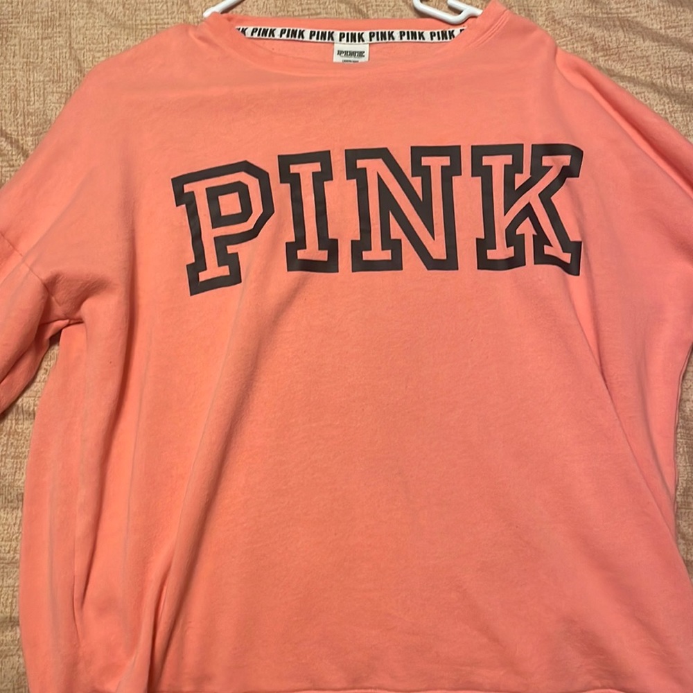 Pink Victoria’s Secret sweatshirt